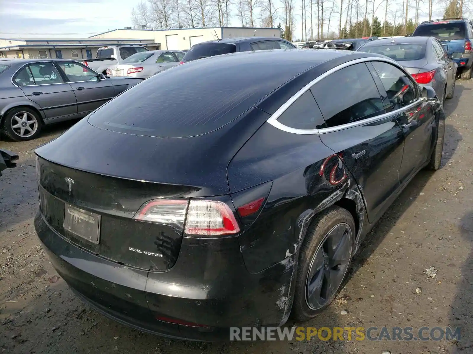 4 Photograph of a damaged car 5YJ3E1EB2LF711414 TESLA MODEL 3 2020