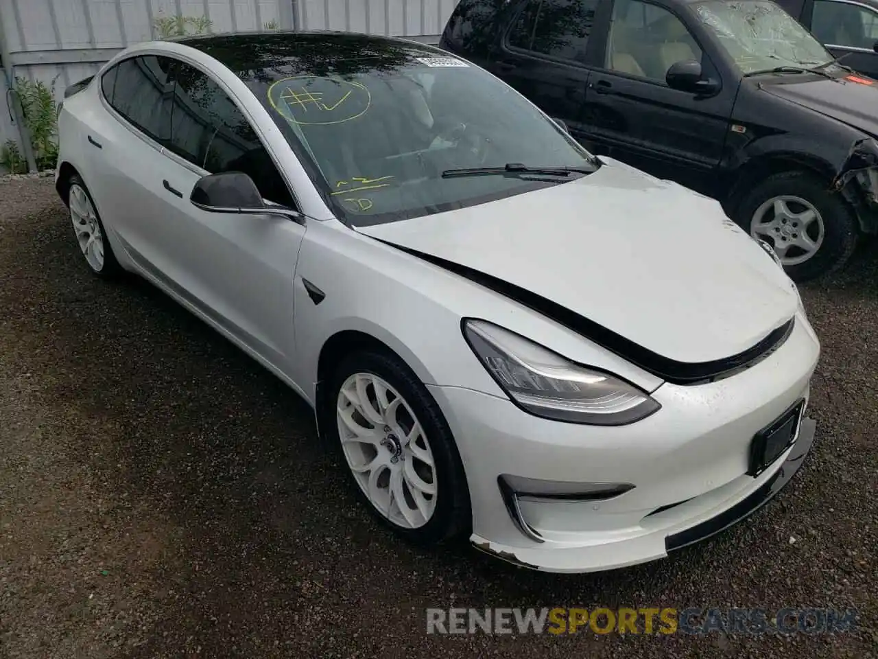 1 Photograph of a damaged car 5YJ3E1EB2LF716435 TESLA MODEL 3 2020