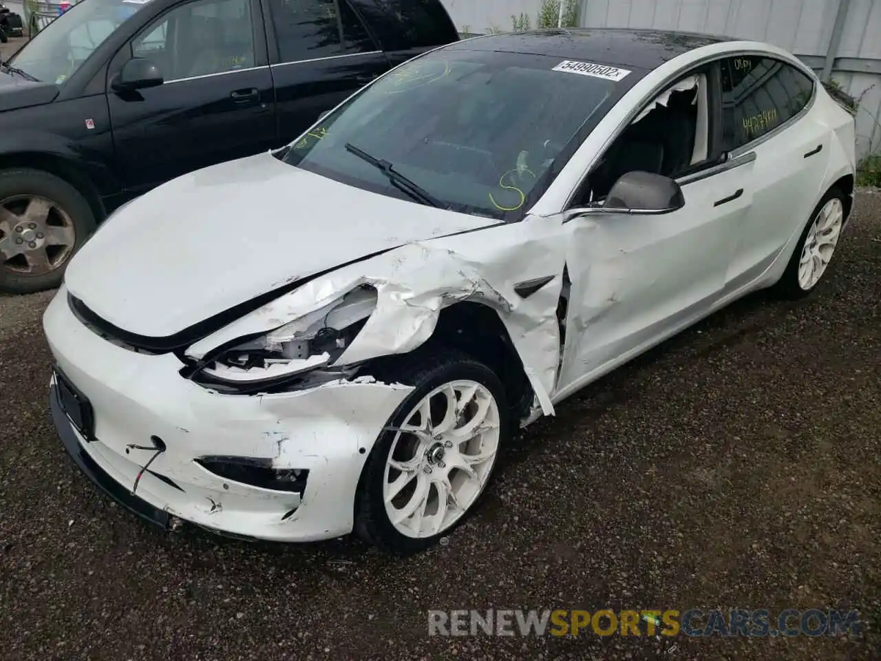 2 Photograph of a damaged car 5YJ3E1EB2LF716435 TESLA MODEL 3 2020