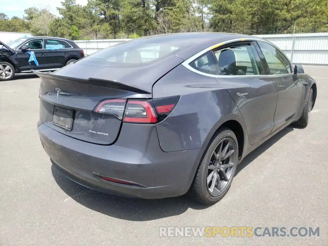 4 Photograph of a damaged car 5YJ3E1EB2LF717505 TESLA MODEL 3 2020