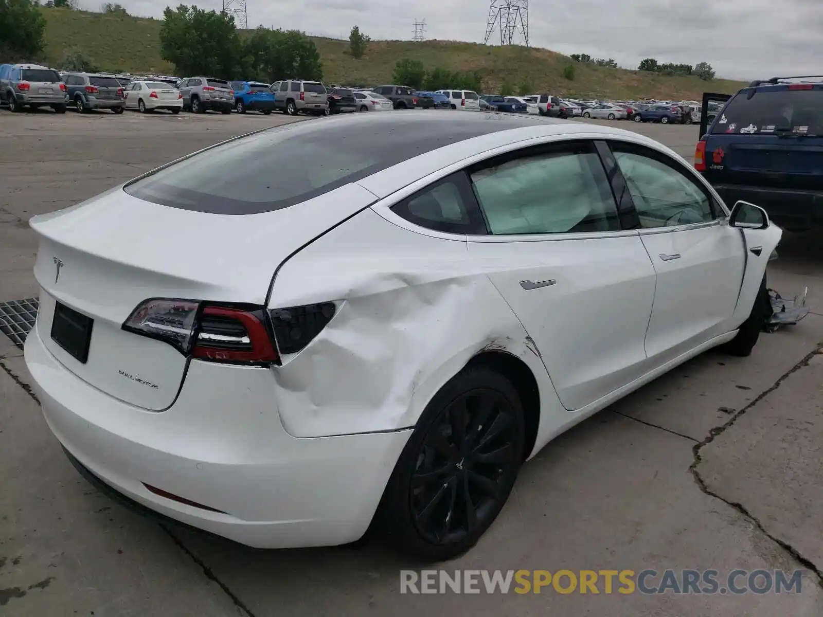 4 Photograph of a damaged car 5YJ3E1EB2LF783150 TESLA MODEL 3 2020