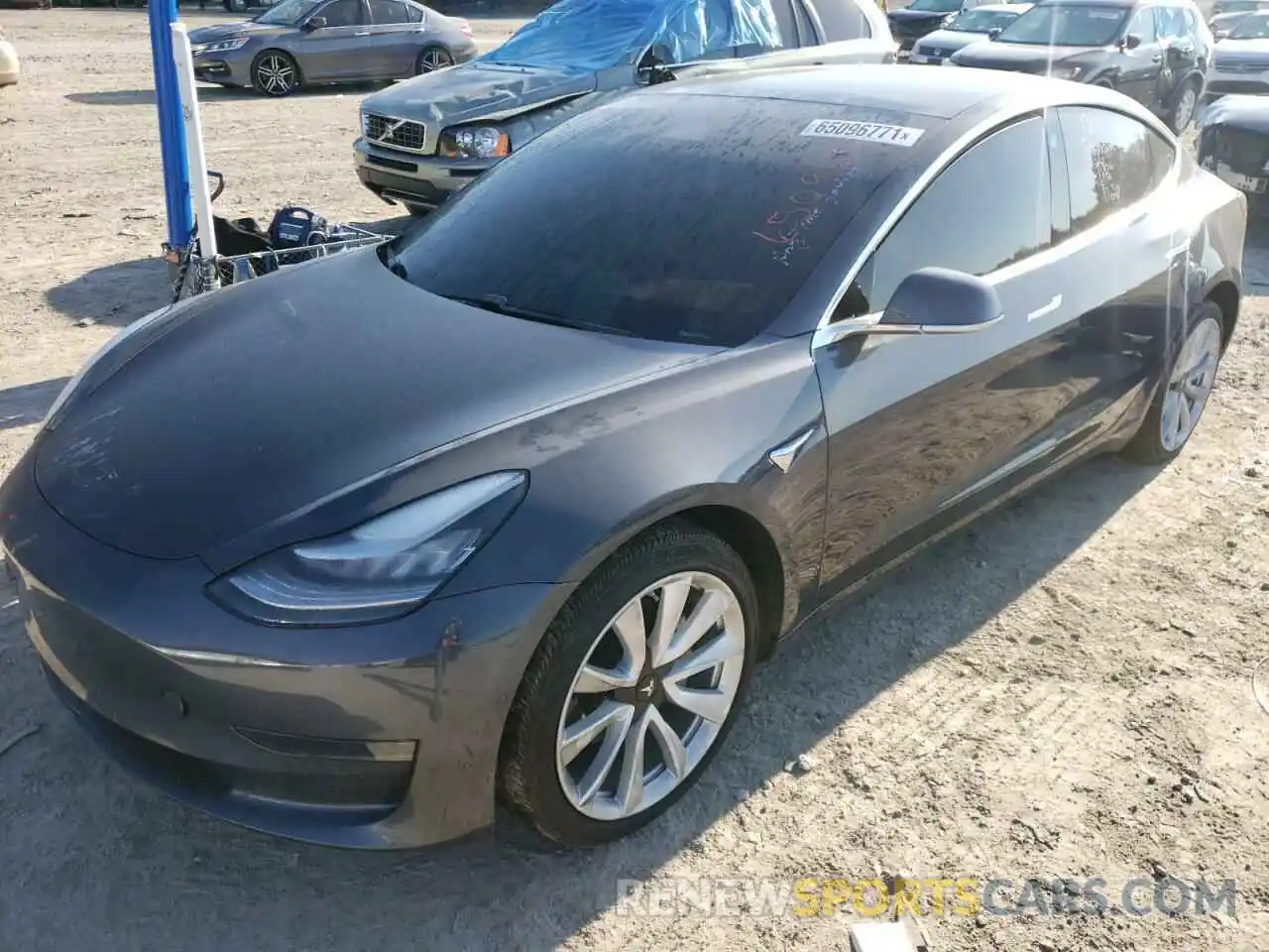 2 Photograph of a damaged car 5YJ3E1EB2LF801159 TESLA MODEL 3 2020