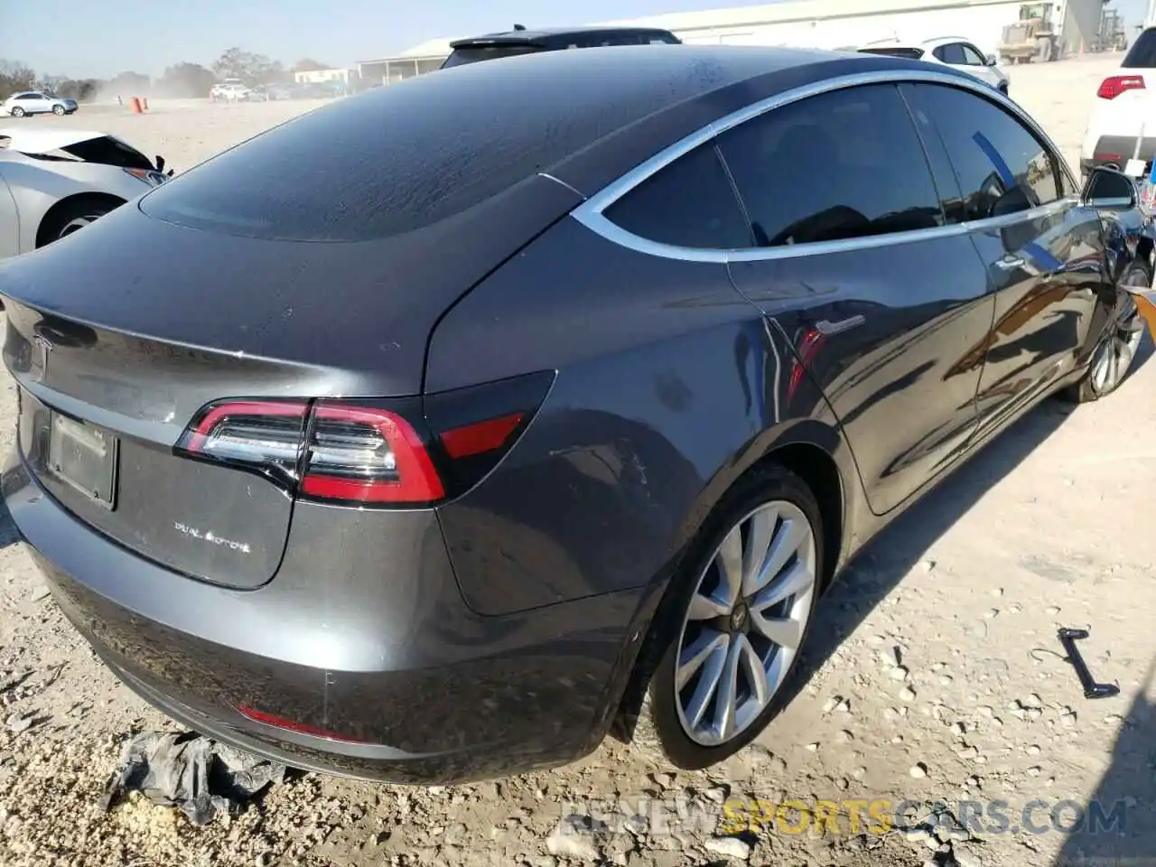 4 Photograph of a damaged car 5YJ3E1EB2LF801159 TESLA MODEL 3 2020