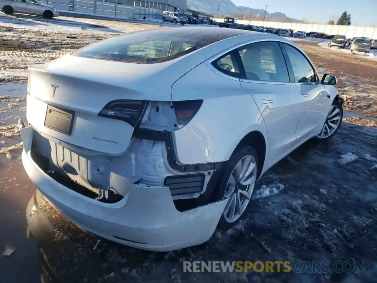 4 Photograph of a damaged car 5YJ3E1EB2LF802022 TESLA MODEL 3 2020