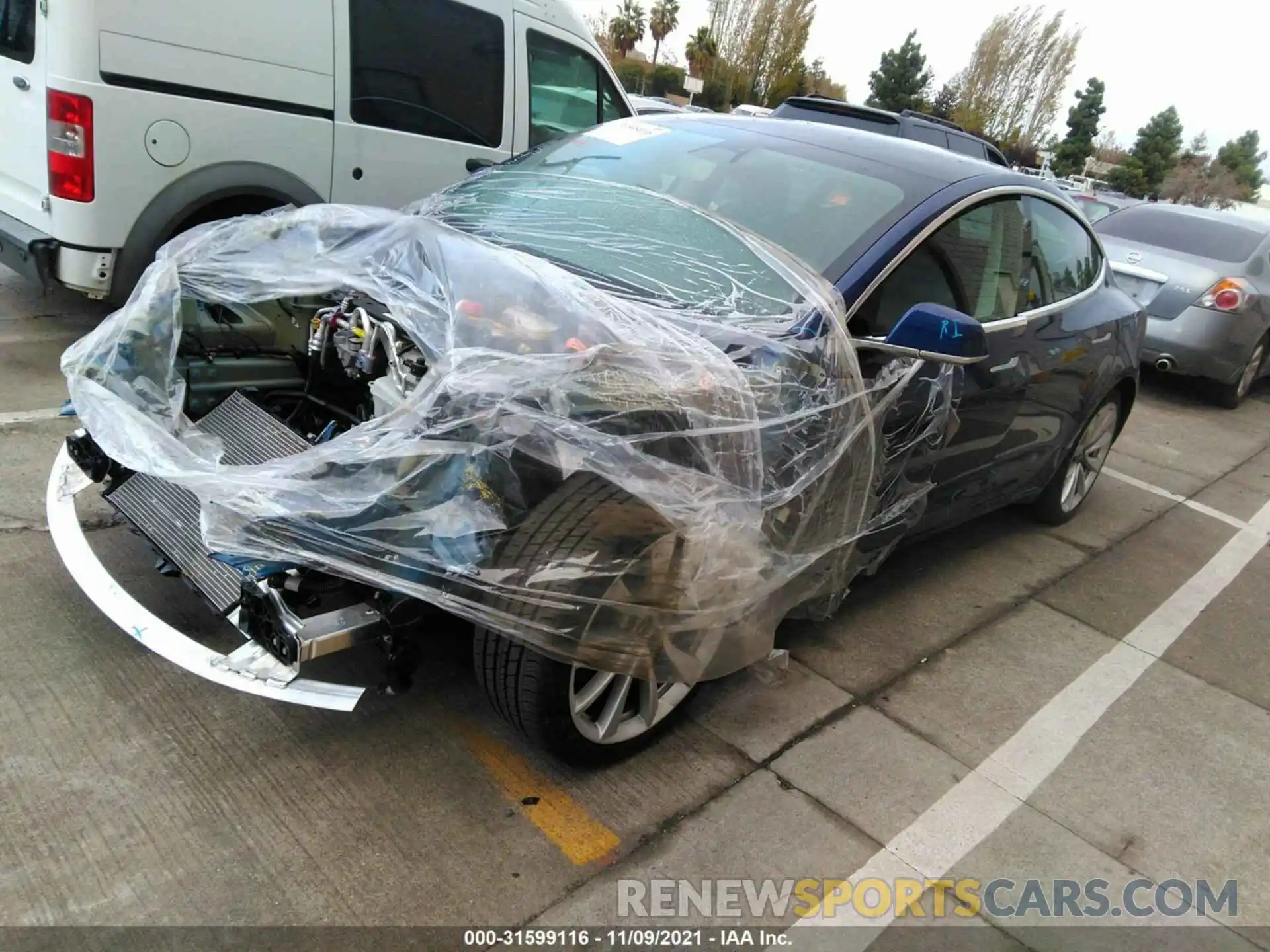 2 Photograph of a damaged car 5YJ3E1EB2LF807141 TESLA MODEL 3 2020