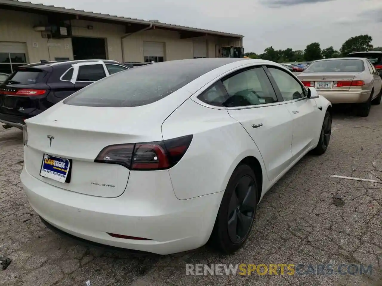 4 Photograph of a damaged car 5YJ3E1EB3LF525414 TESLA MODEL 3 2020