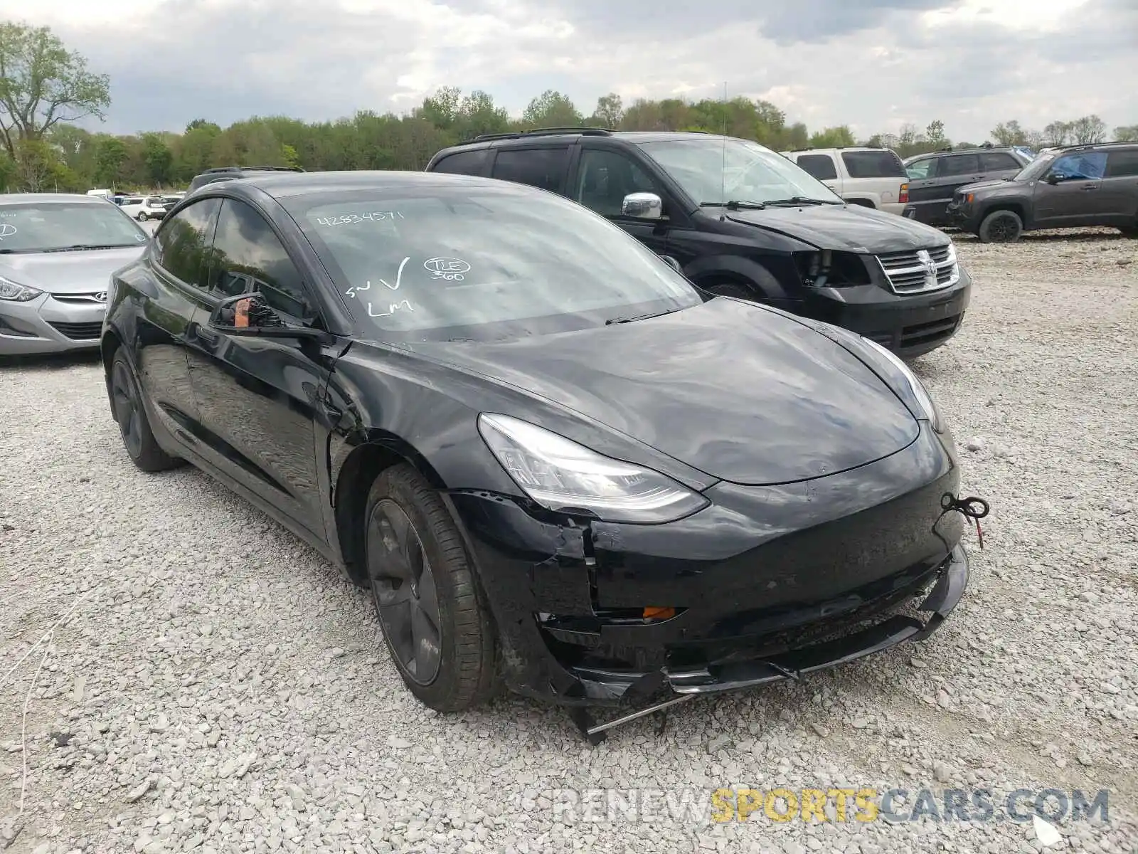 1 Photograph of a damaged car 5YJ3E1EB3LF599691 TESLA MODEL 3 2020