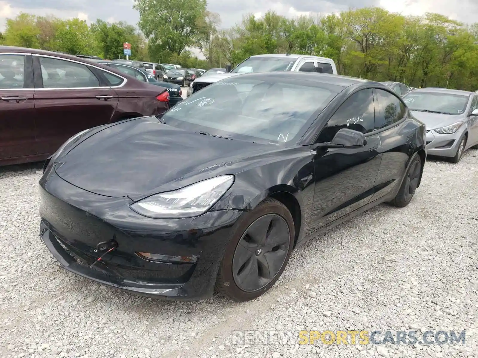 2 Photograph of a damaged car 5YJ3E1EB3LF599691 TESLA MODEL 3 2020