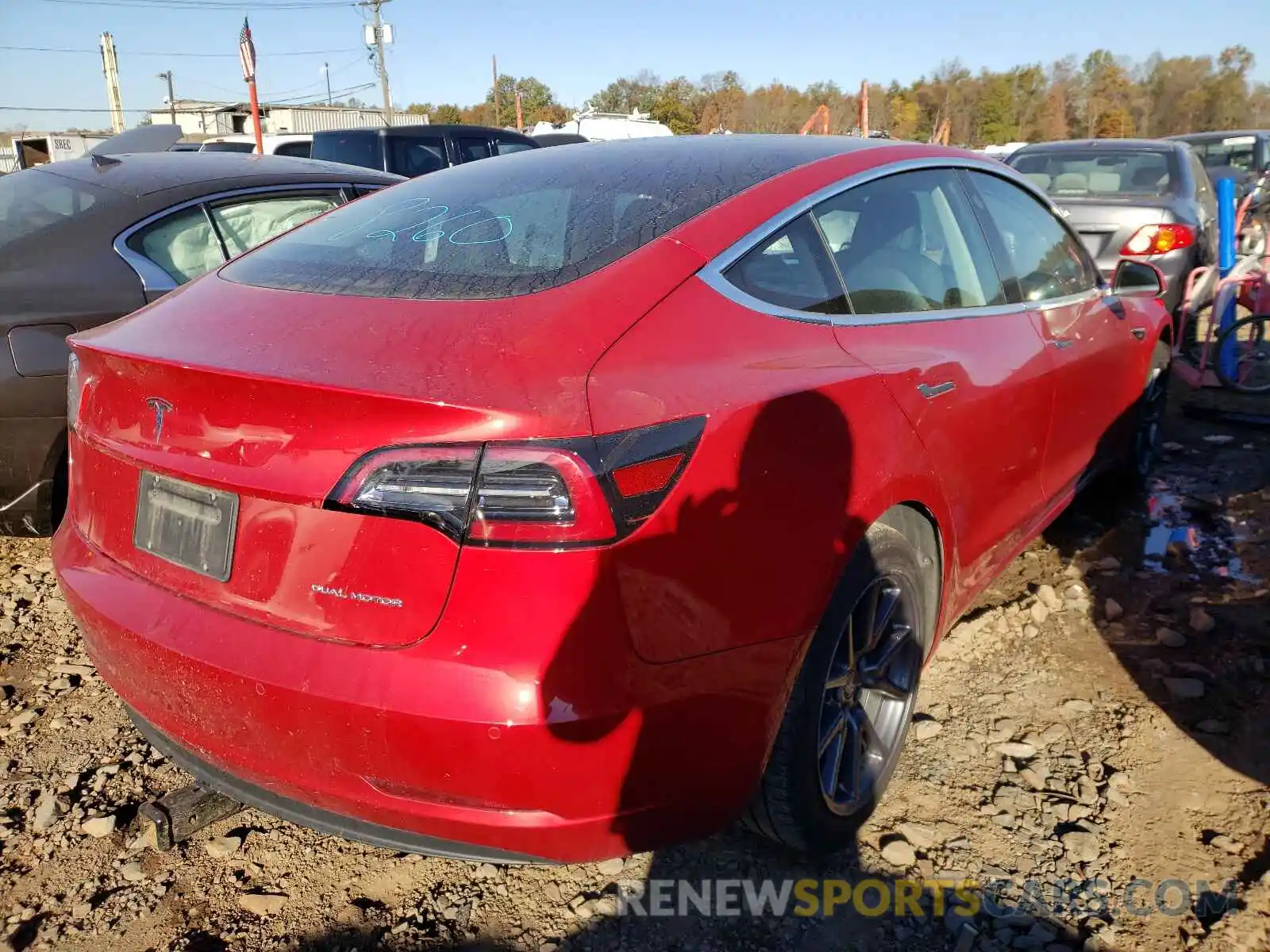 4 Photograph of a damaged car 5YJ3E1EB3LF600273 TESLA MODEL 3 2020