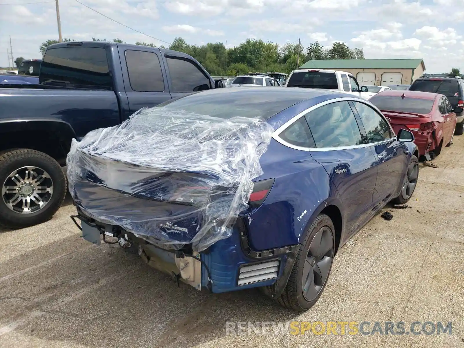 4 Photograph of a damaged car 5YJ3E1EB3LF617591 TESLA MODEL 3 2020