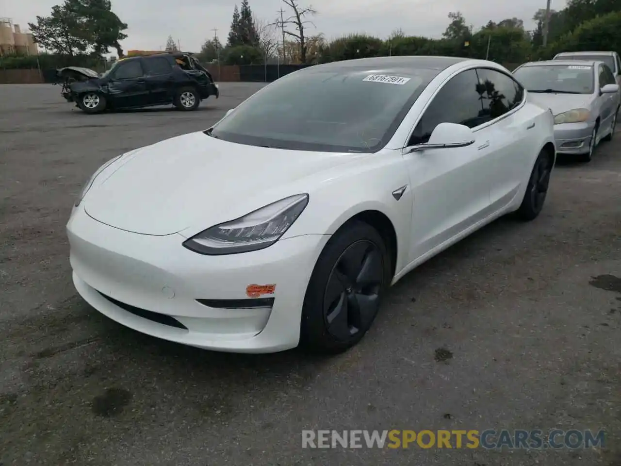 2 Photograph of a damaged car 5YJ3E1EB3LF619566 TESLA MODEL 3 2020