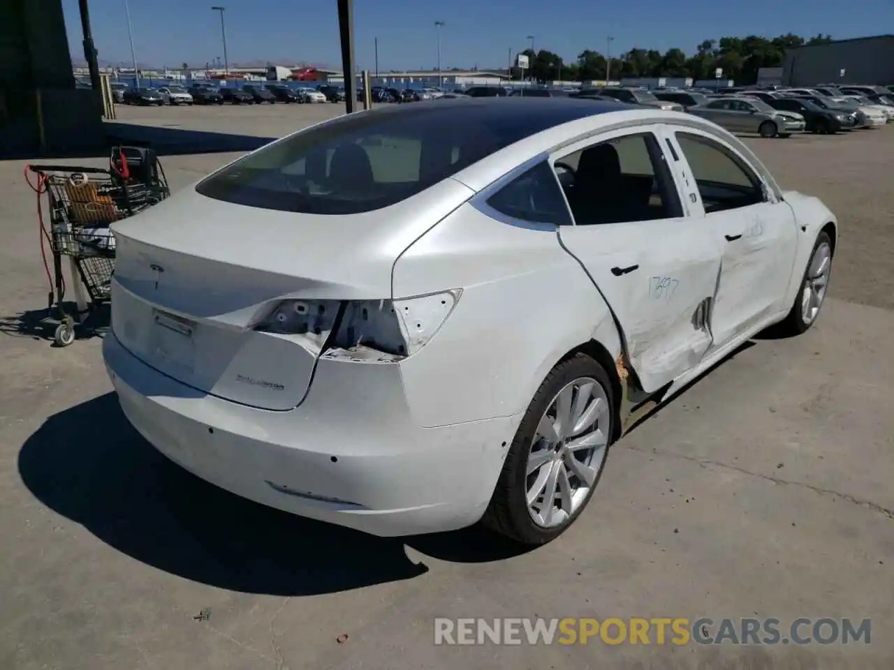 4 Photograph of a damaged car 5YJ3E1EB3LF621687 TESLA MODEL 3 2020