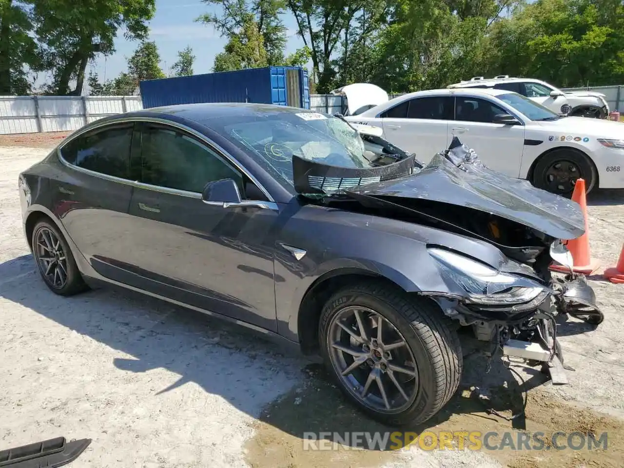 4 Photograph of a damaged car 5YJ3E1EB3LF636903 TESLA MODEL 3 2020