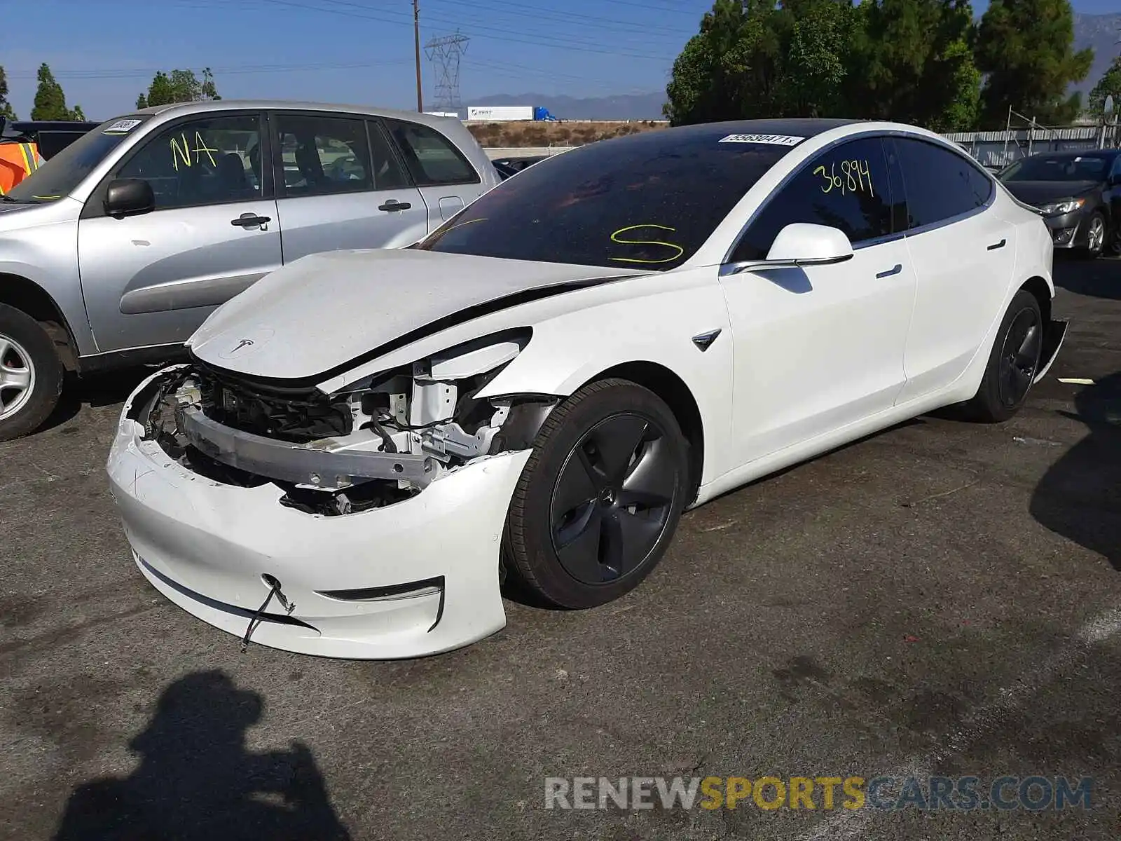 2 Photograph of a damaged car 5YJ3E1EB3LF637114 TESLA MODEL 3 2020