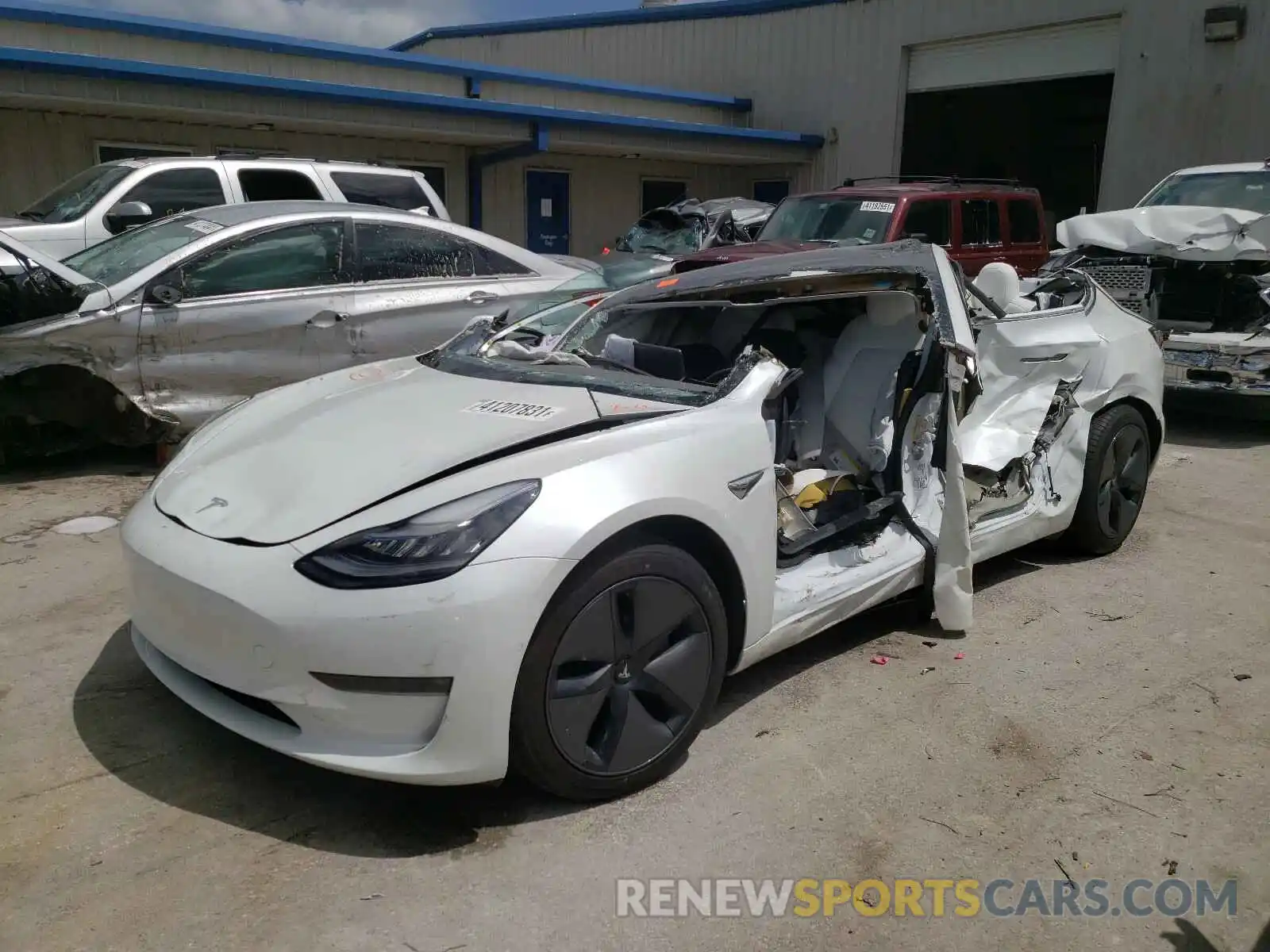 2 Photograph of a damaged car 5YJ3E1EB3LF639705 TESLA MODEL 3 2020