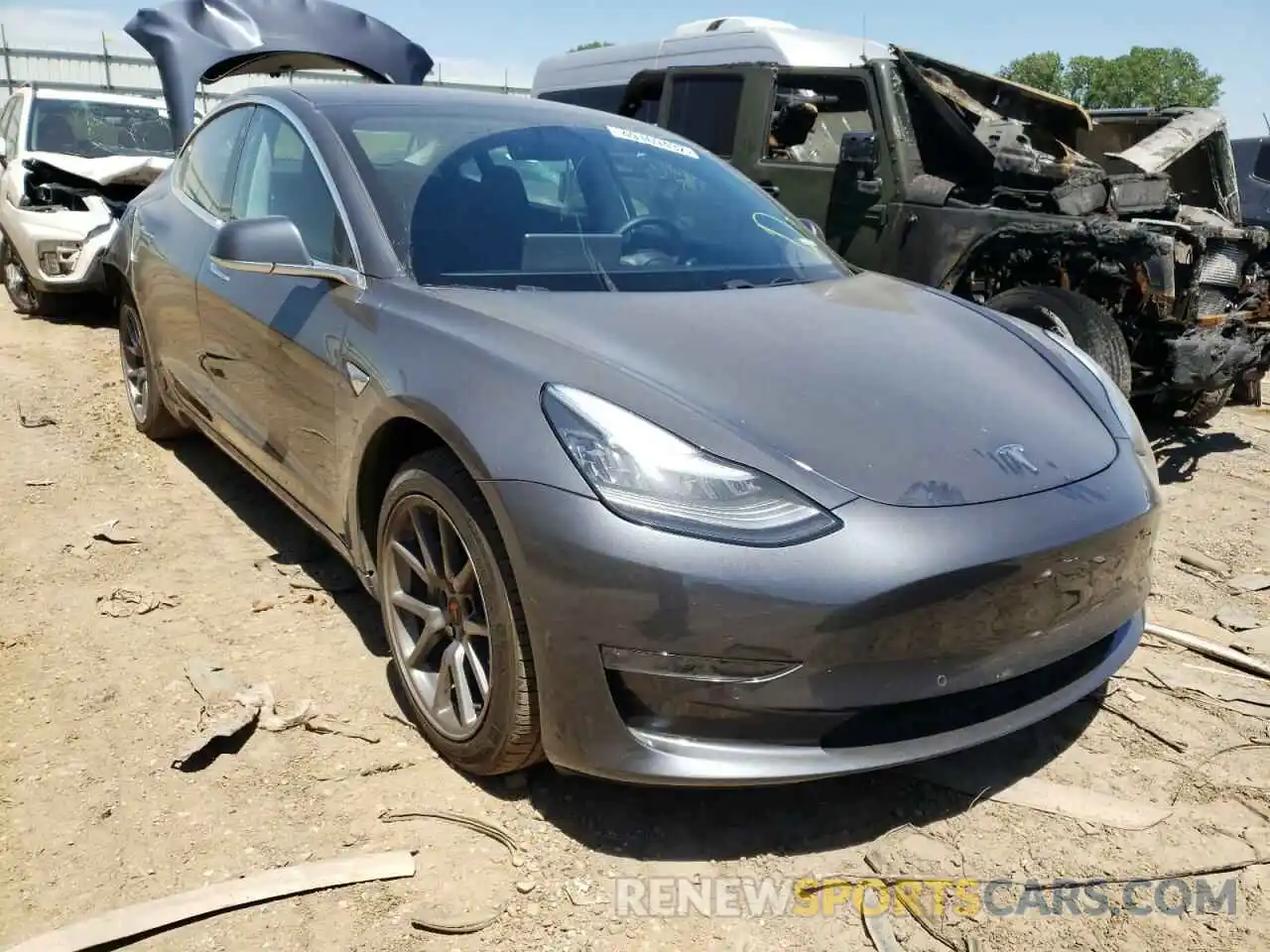 1 Photograph of a damaged car 5YJ3E1EB3LF663583 TESLA MODEL 3 2020