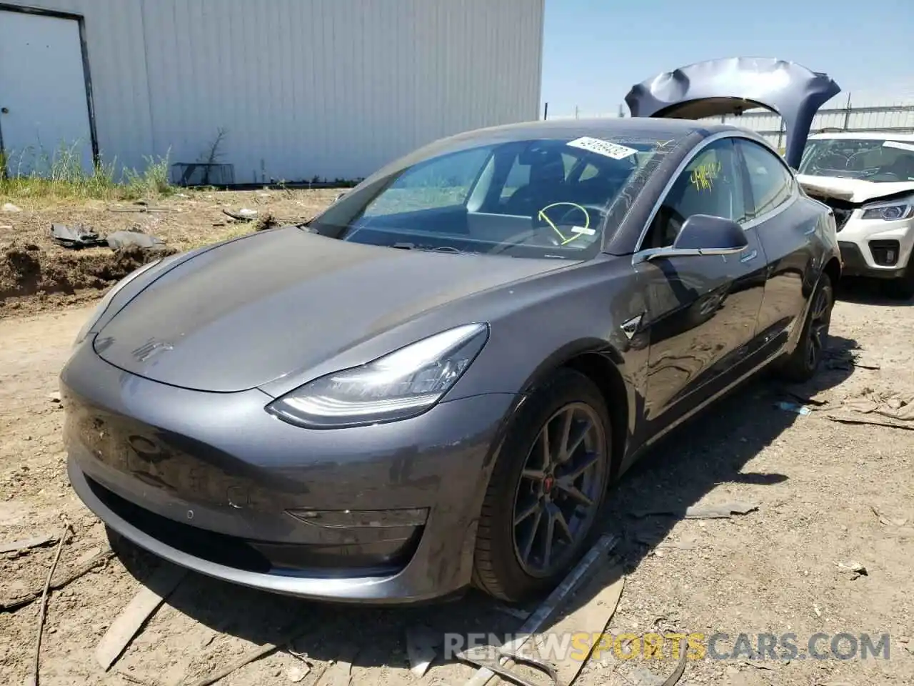 2 Photograph of a damaged car 5YJ3E1EB3LF663583 TESLA MODEL 3 2020