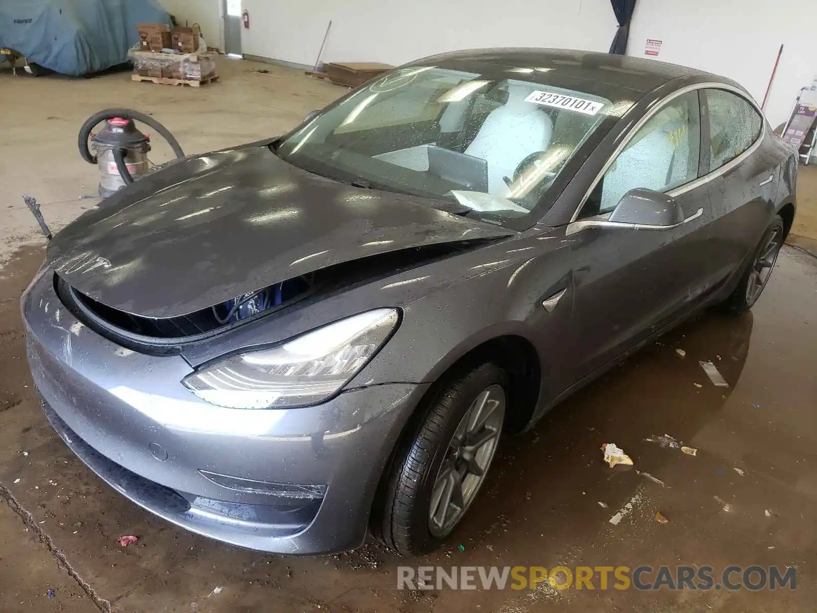 2 Photograph of a damaged car 5YJ3E1EB3LF667973 TESLA MODEL 3 2020