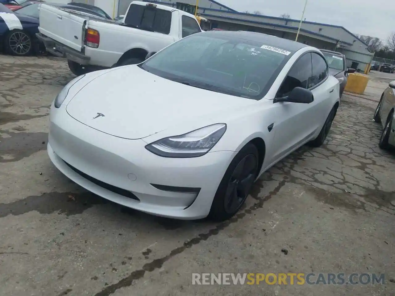 2 Photograph of a damaged car 5YJ3E1EB3LF710403 TESLA MODEL 3 2020