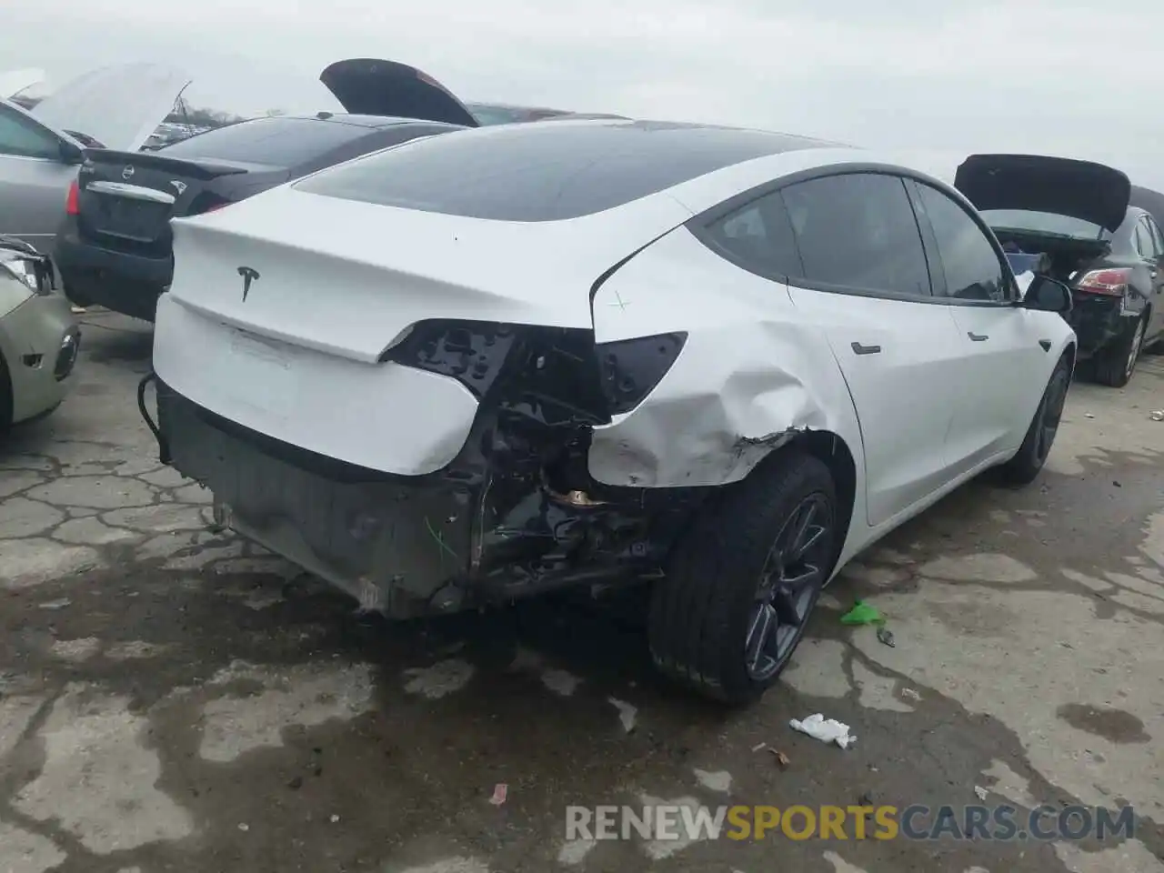 4 Photograph of a damaged car 5YJ3E1EB3LF710403 TESLA MODEL 3 2020