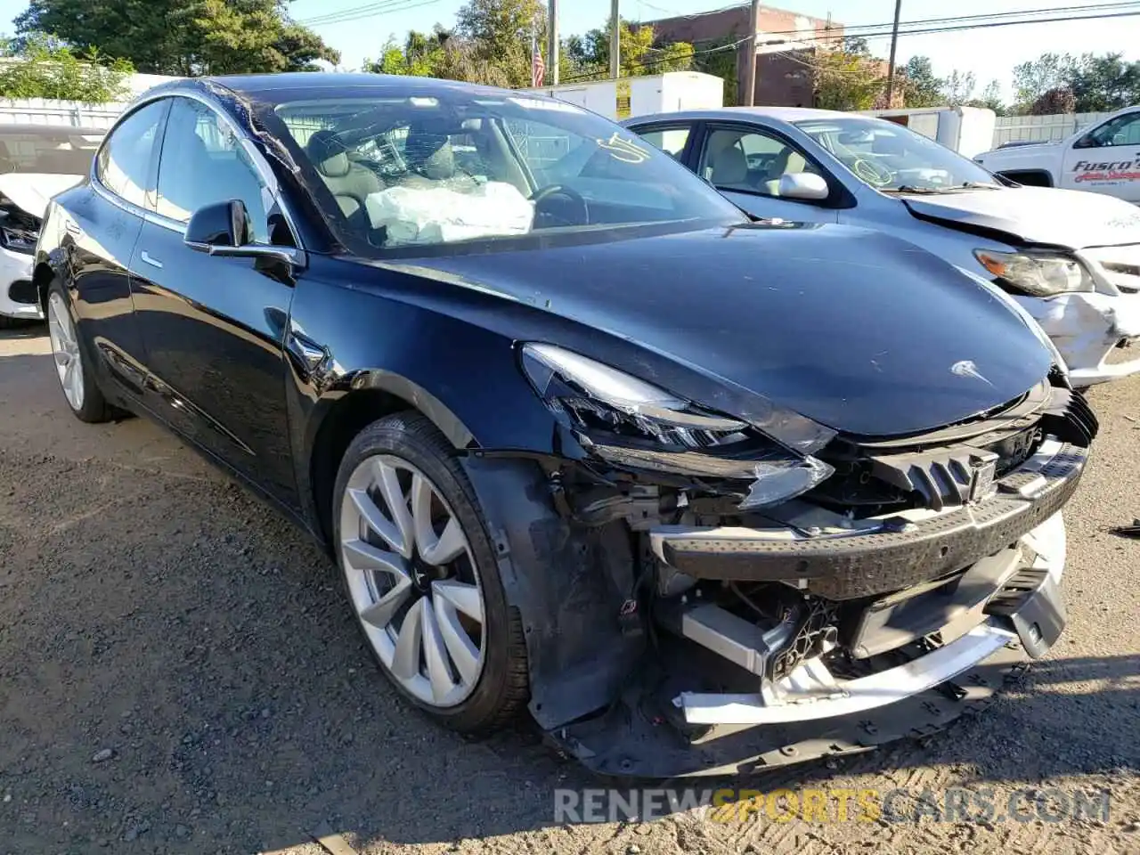 4 Photograph of a damaged car 5YJ3E1EB3LF711762 TESLA MODEL 3 2020