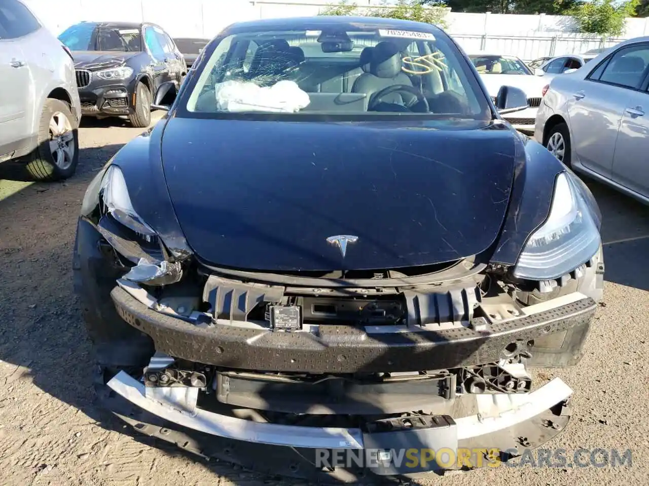 5 Photograph of a damaged car 5YJ3E1EB3LF711762 TESLA MODEL 3 2020