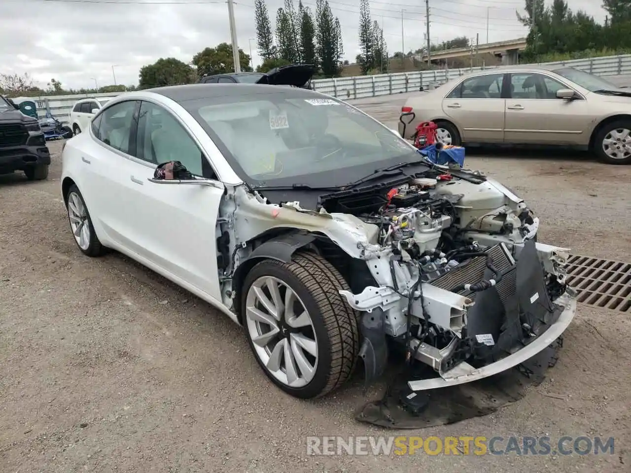 1 Photograph of a damaged car 5YJ3E1EB3LF796117 TESLA MODEL 3 2020