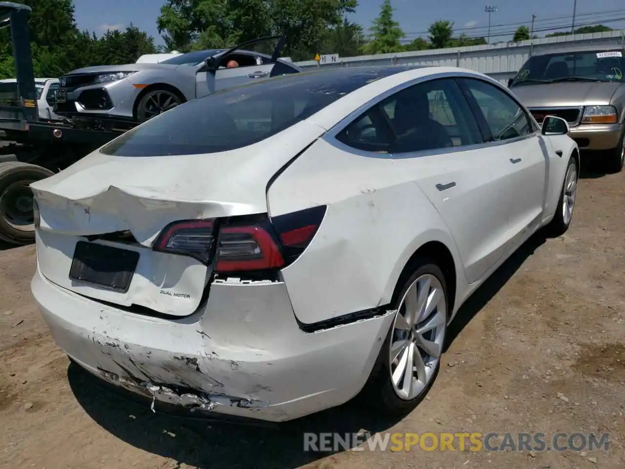 4 Photograph of a damaged car 5YJ3E1EB4LF512235 TESLA MODEL 3 2020