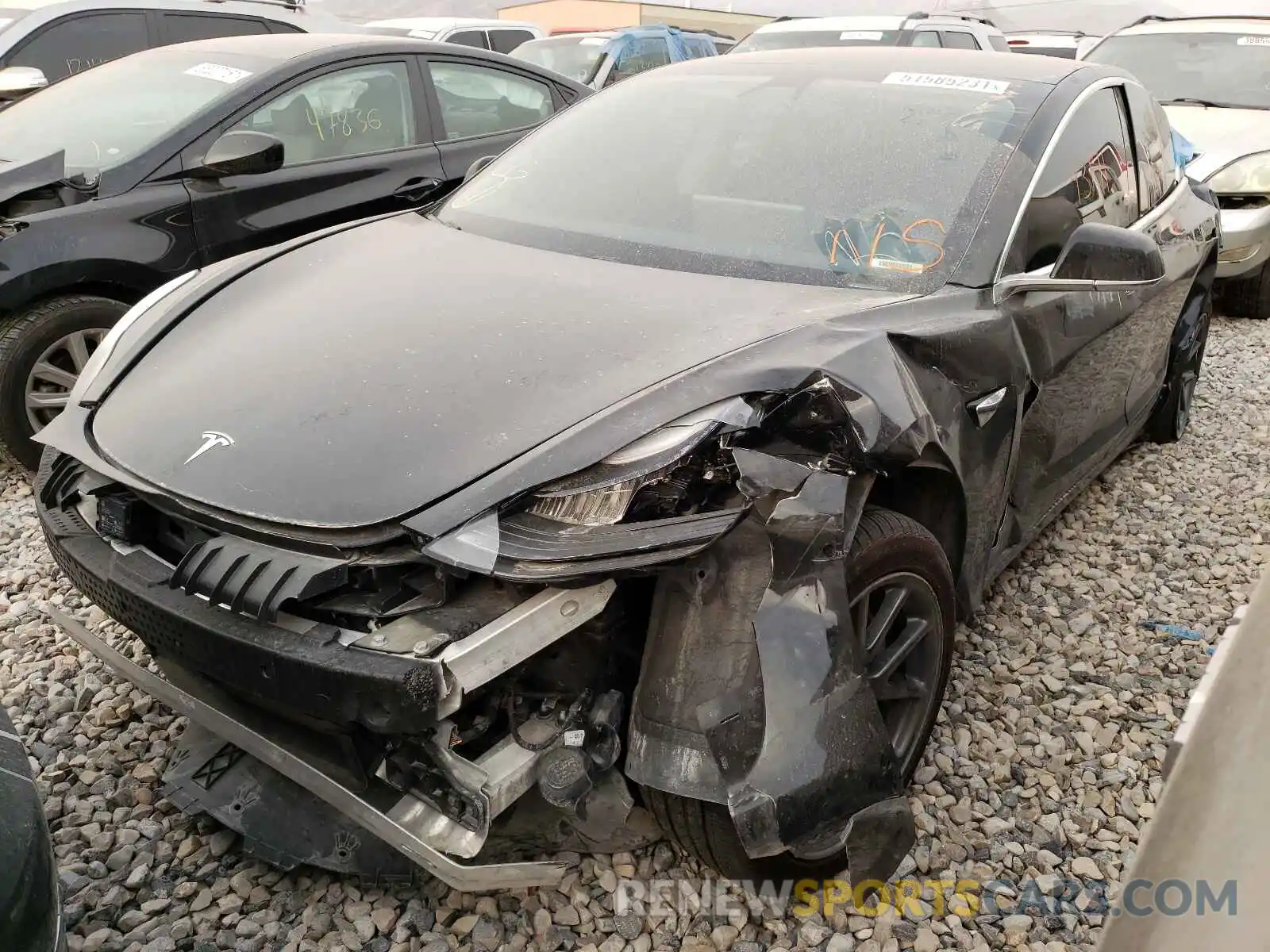 2 Photograph of a damaged car 5YJ3E1EB4LF520609 TESLA MODEL 3 2020