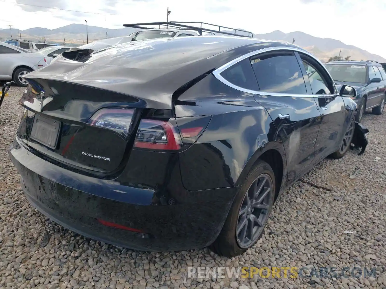 4 Photograph of a damaged car 5YJ3E1EB4LF520609 TESLA MODEL 3 2020