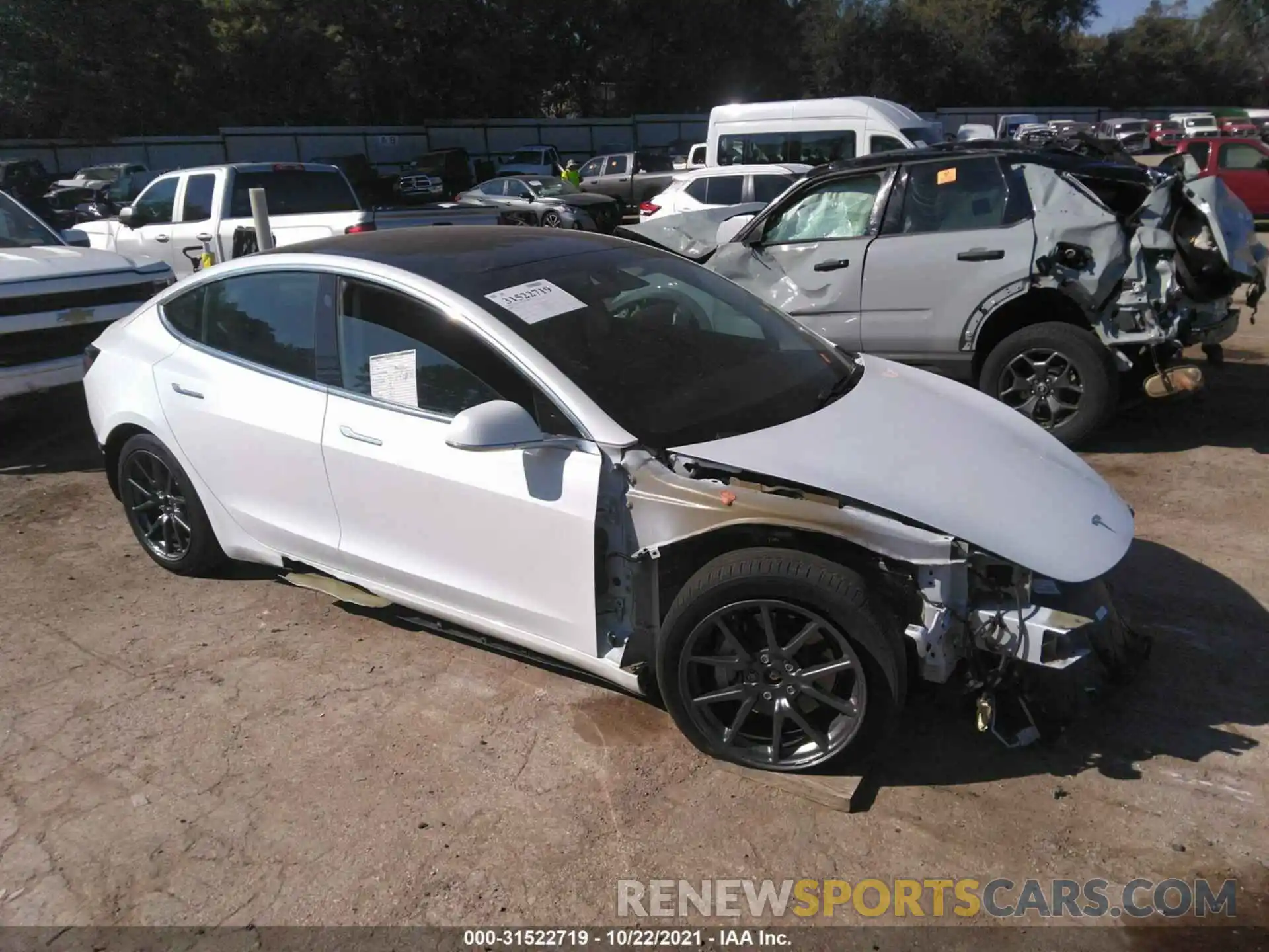 1 Photograph of a damaged car 5YJ3E1EB4LF618409 TESLA MODEL 3 2020