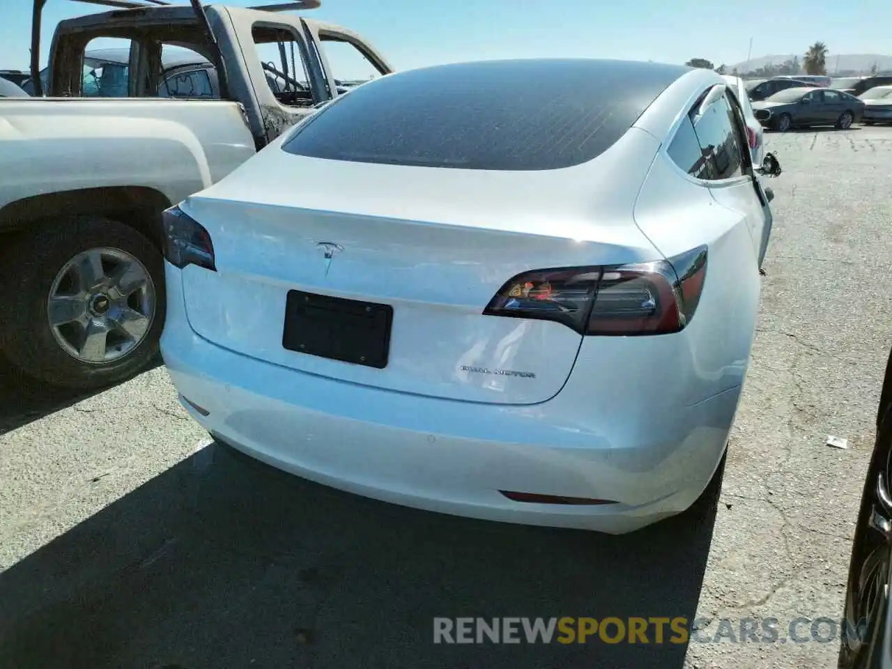 4 Photograph of a damaged car 5YJ3E1EB4LF619401 TESLA MODEL 3 2020