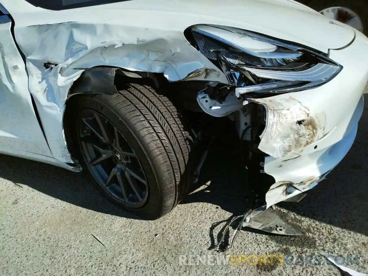 9 Photograph of a damaged car 5YJ3E1EB4LF619401 TESLA MODEL 3 2020