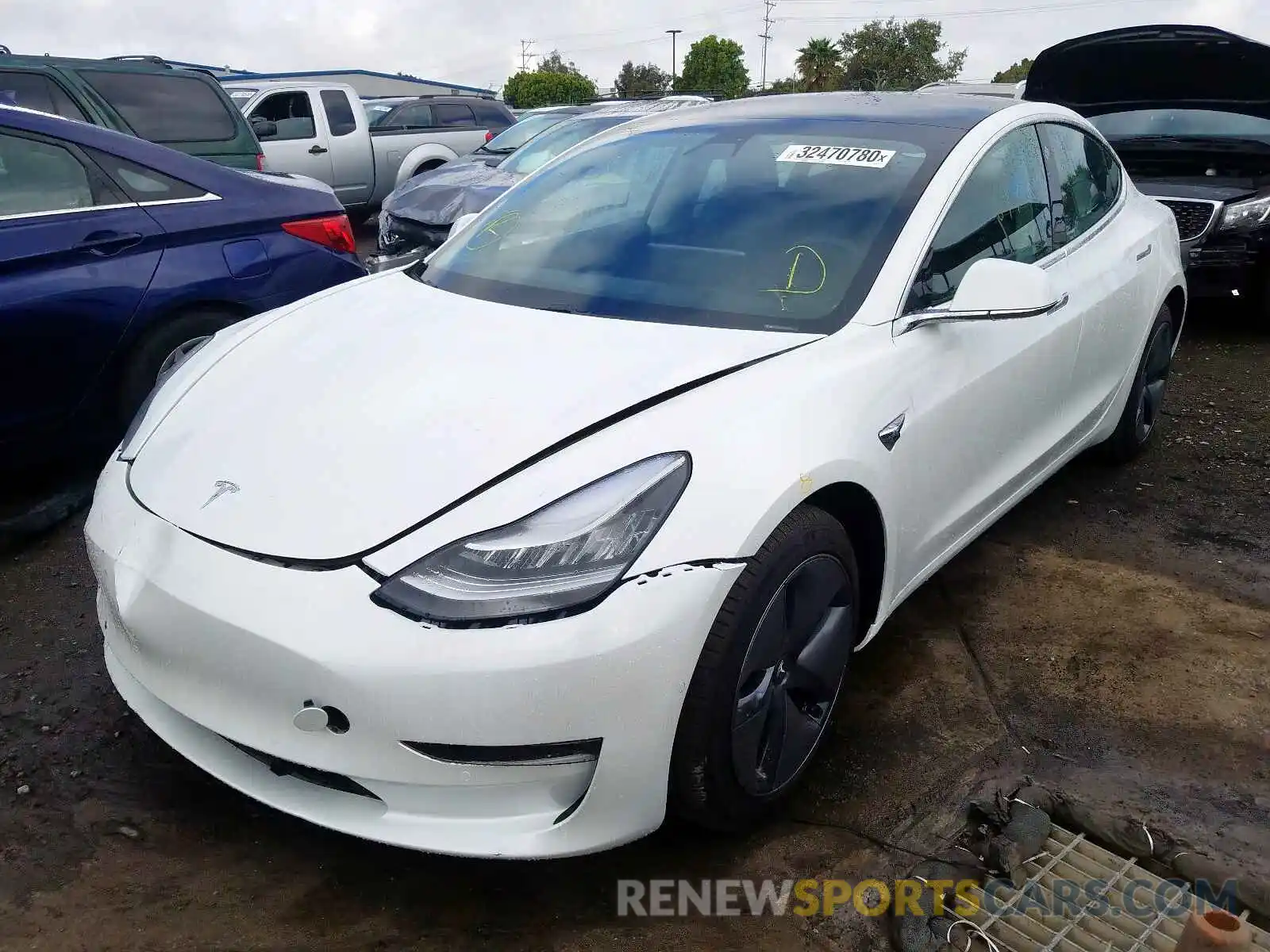 2 Photograph of a damaged car 5YJ3E1EB4LF619575 TESLA MODEL 3 2020