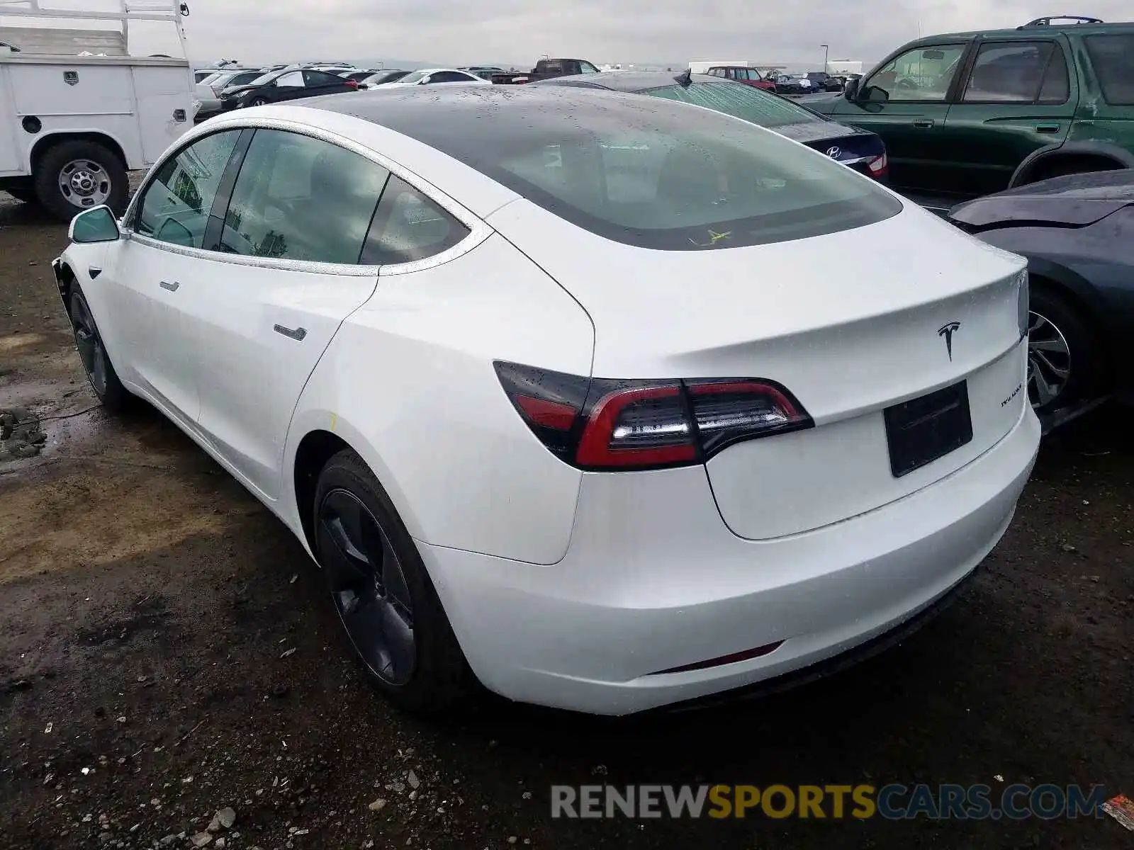 3 Photograph of a damaged car 5YJ3E1EB4LF619575 TESLA MODEL 3 2020