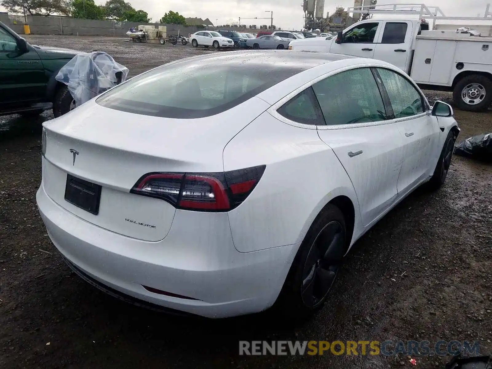 4 Photograph of a damaged car 5YJ3E1EB4LF619575 TESLA MODEL 3 2020