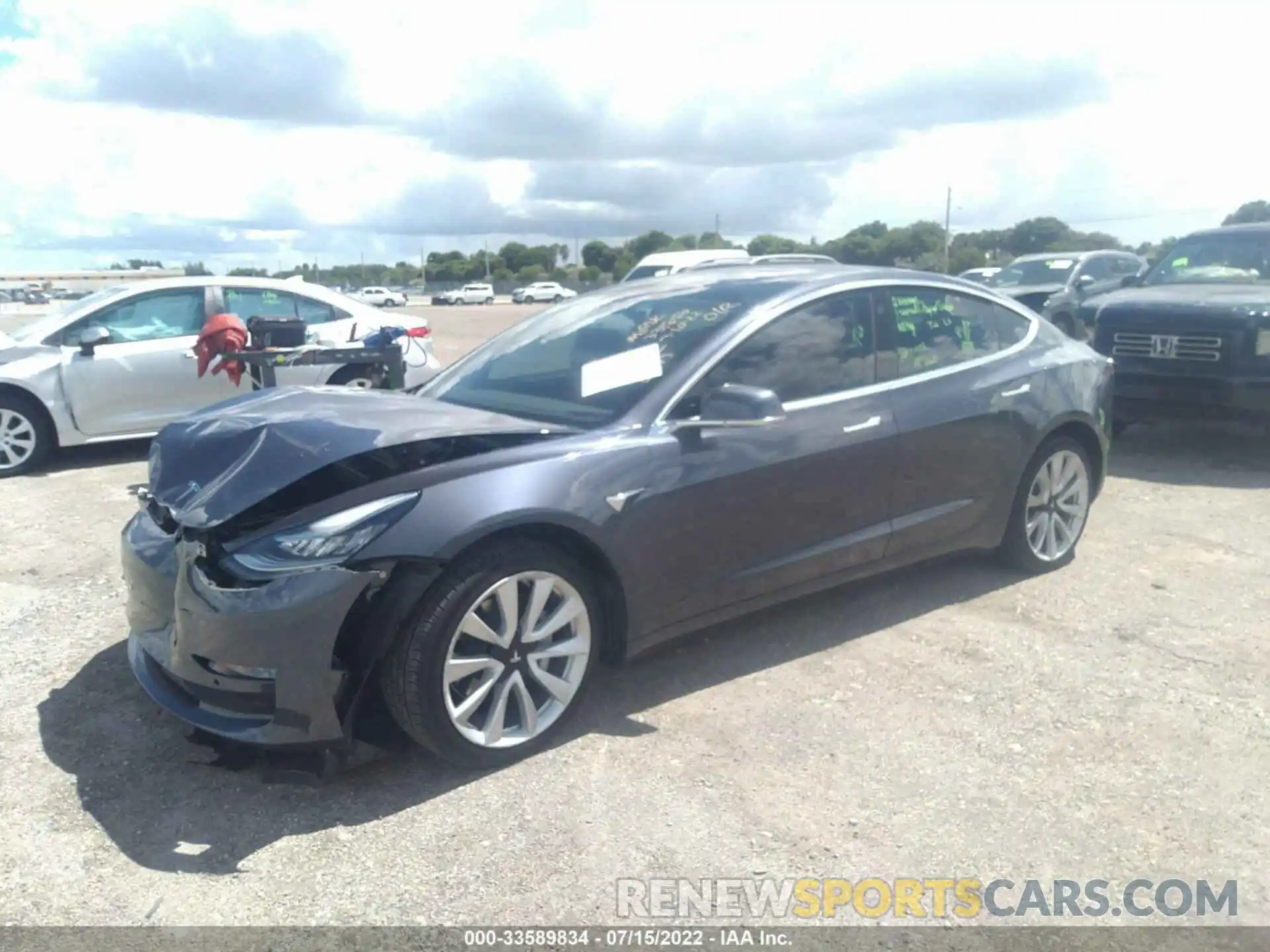 2 Photograph of a damaged car 5YJ3E1EB4LF620175 TESLA MODEL 3 2020