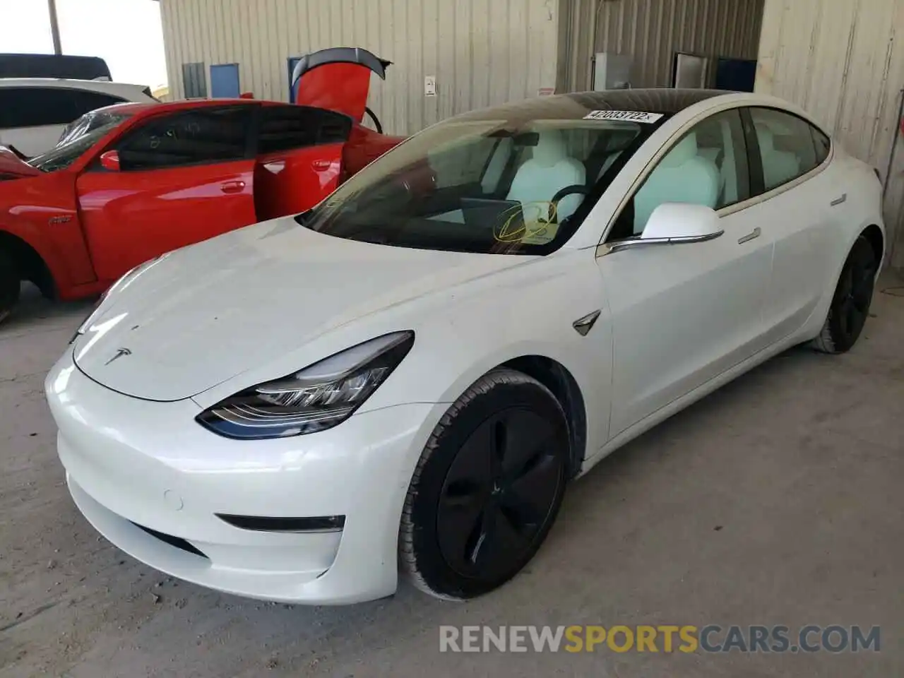 2 Photograph of a damaged car 5YJ3E1EB4LF622122 TESLA MODEL 3 2020