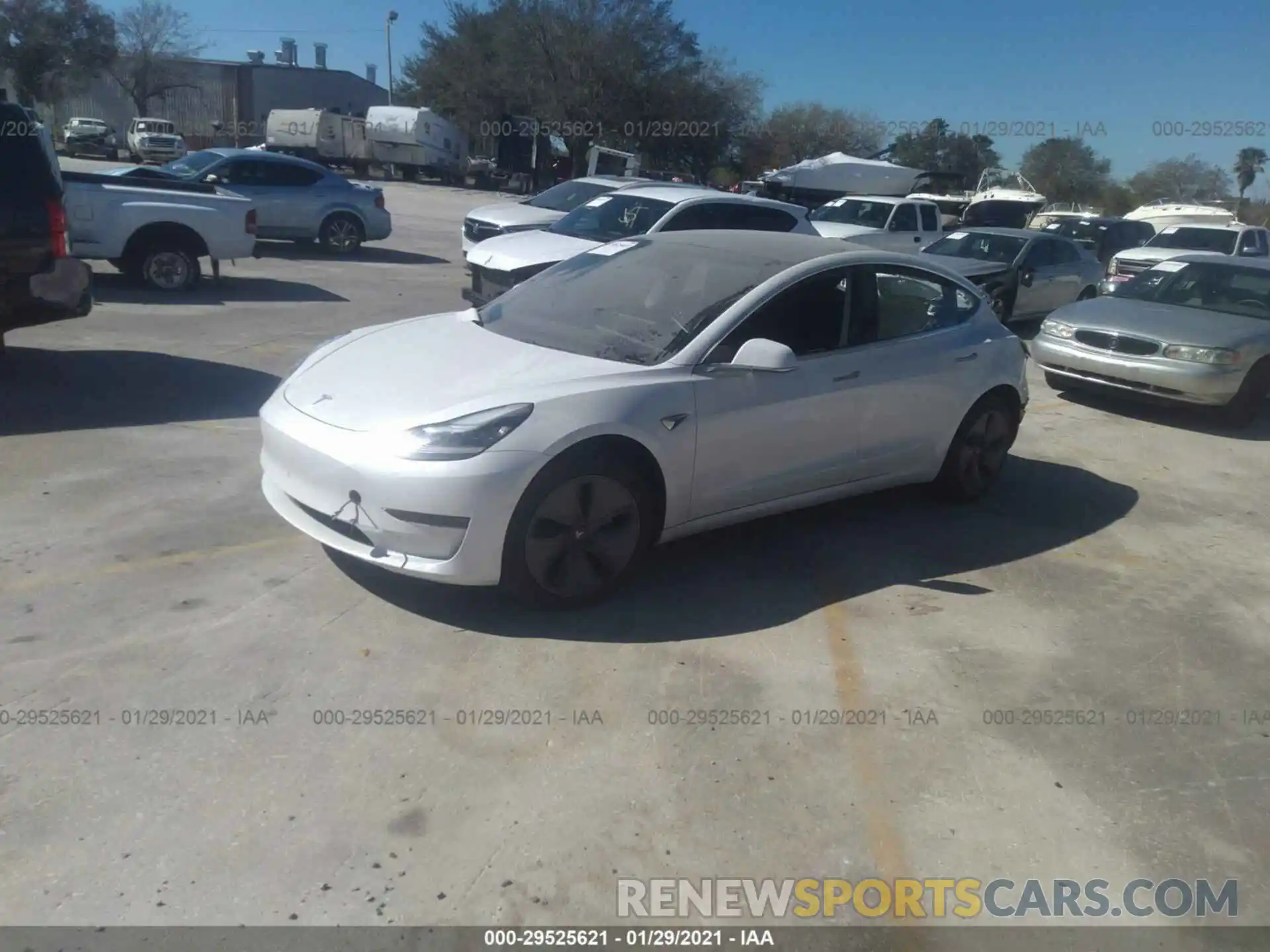 2 Photograph of a damaged car 5YJ3E1EB4LF637610 TESLA MODEL 3 2020