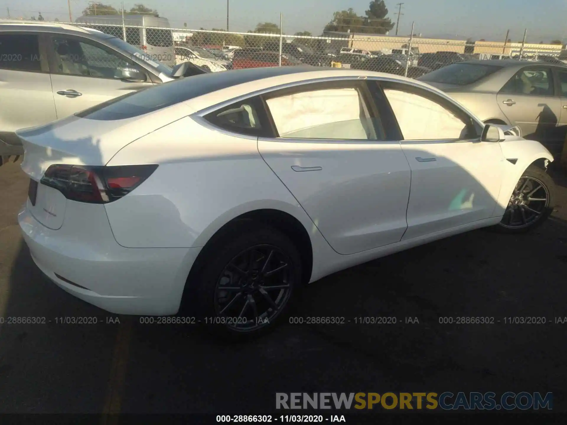 4 Photograph of a damaged car 5YJ3E1EB4LF650339 TESLA MODEL 3 2020