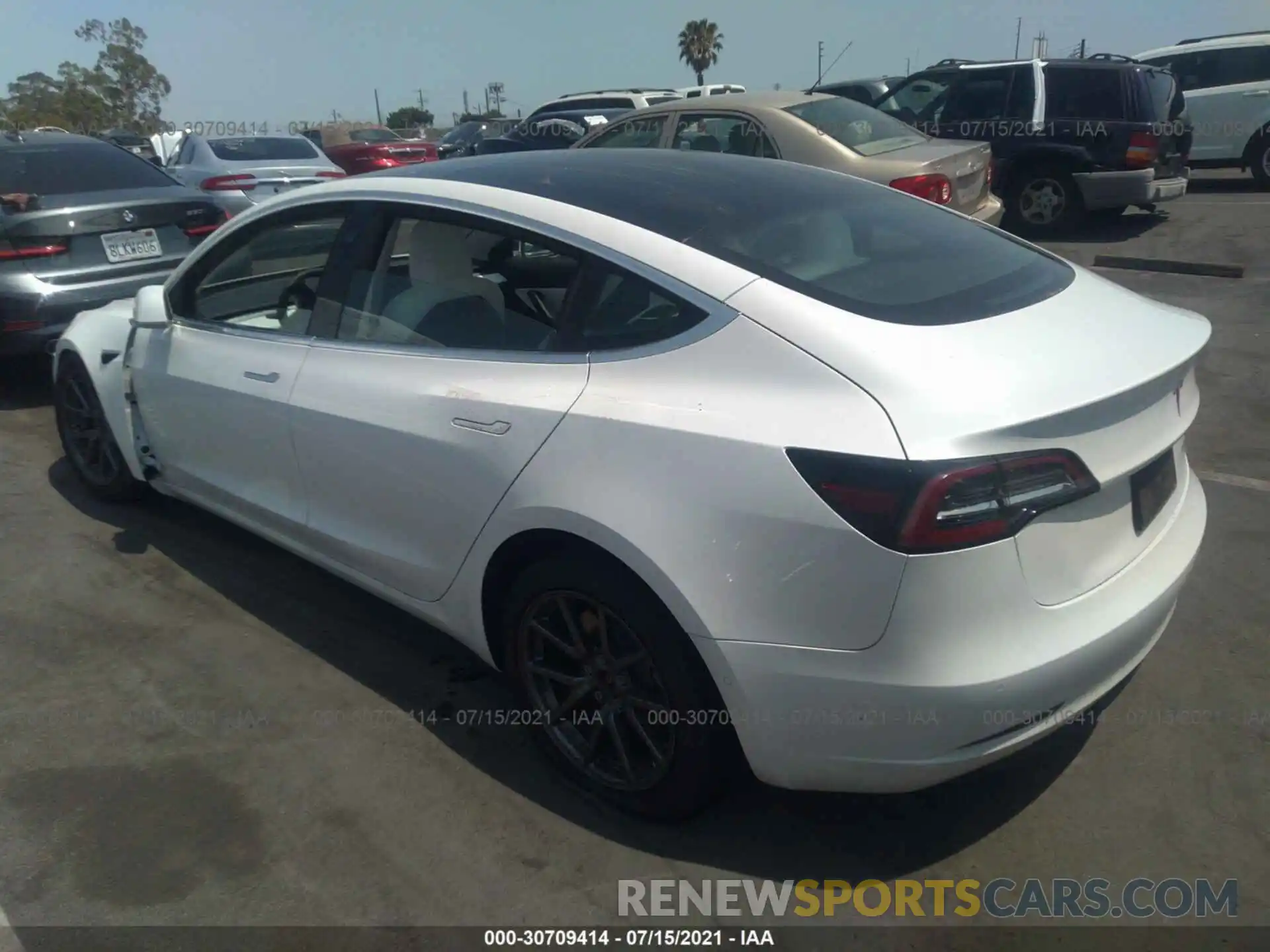 3 Photograph of a damaged car 5YJ3E1EB4LF651569 TESLA MODEL 3 2020