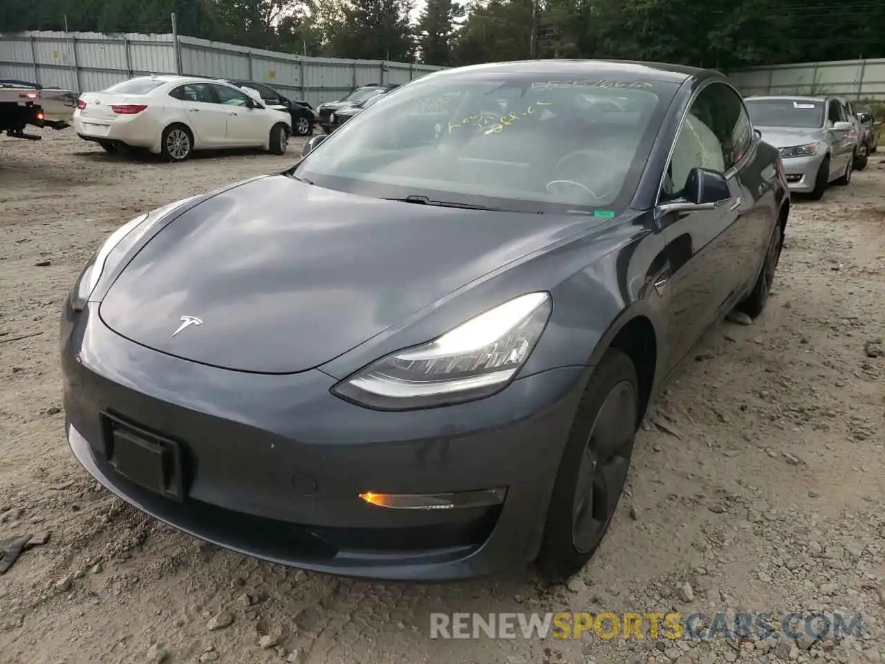 2 Photograph of a damaged car 5YJ3E1EB4LF663320 TESLA MODEL 3 2020