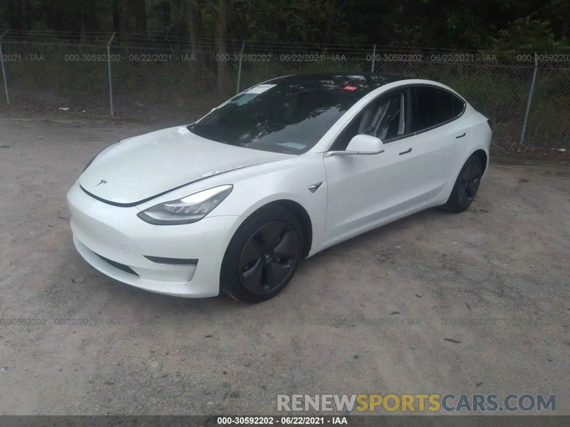 2 Photograph of a damaged car 5YJ3E1EB4LF665598 TESLA MODEL 3 2020