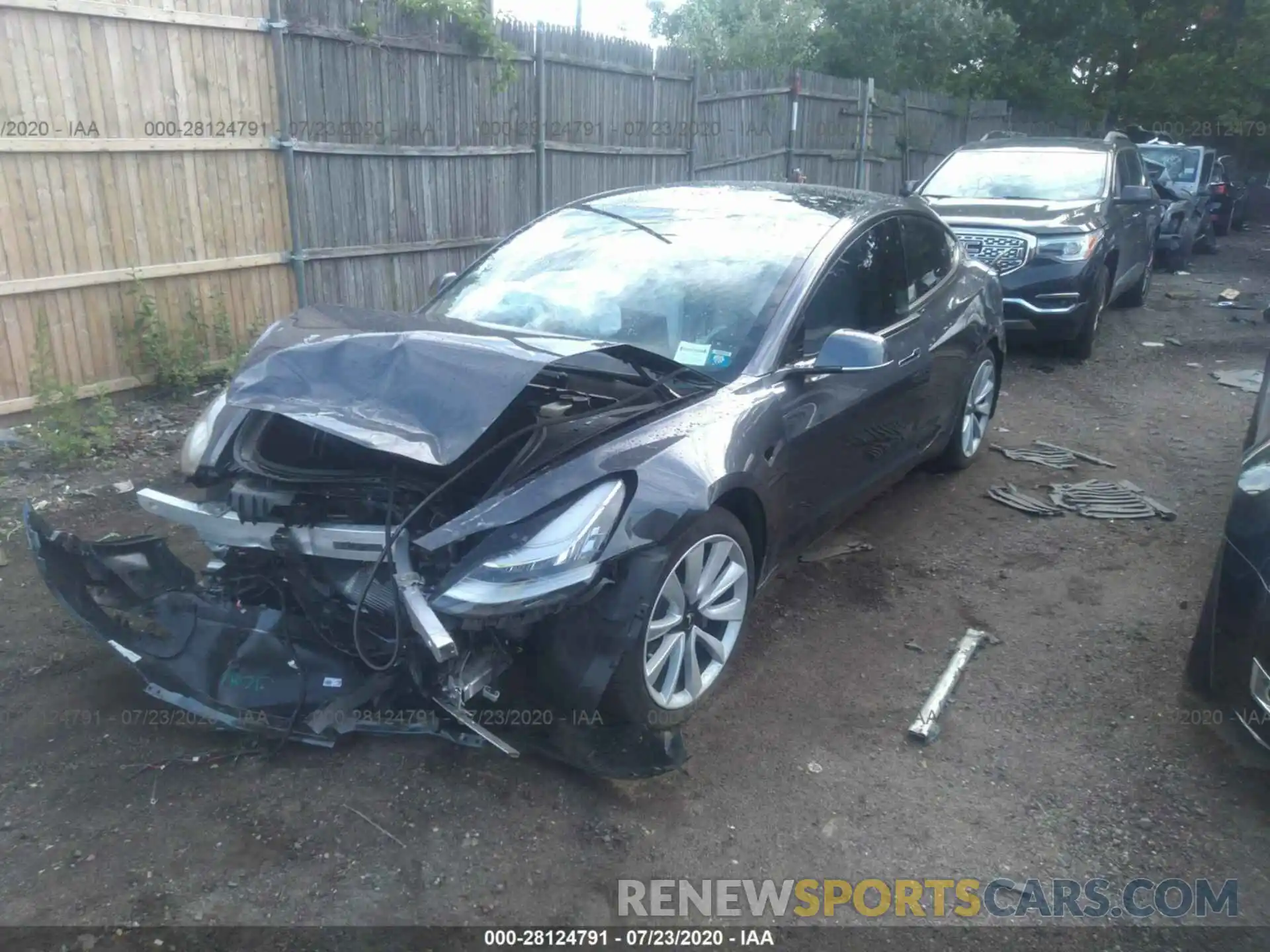 2 Photograph of a damaged car 5YJ3E1EB4LF668842 TESLA MODEL 3 2020