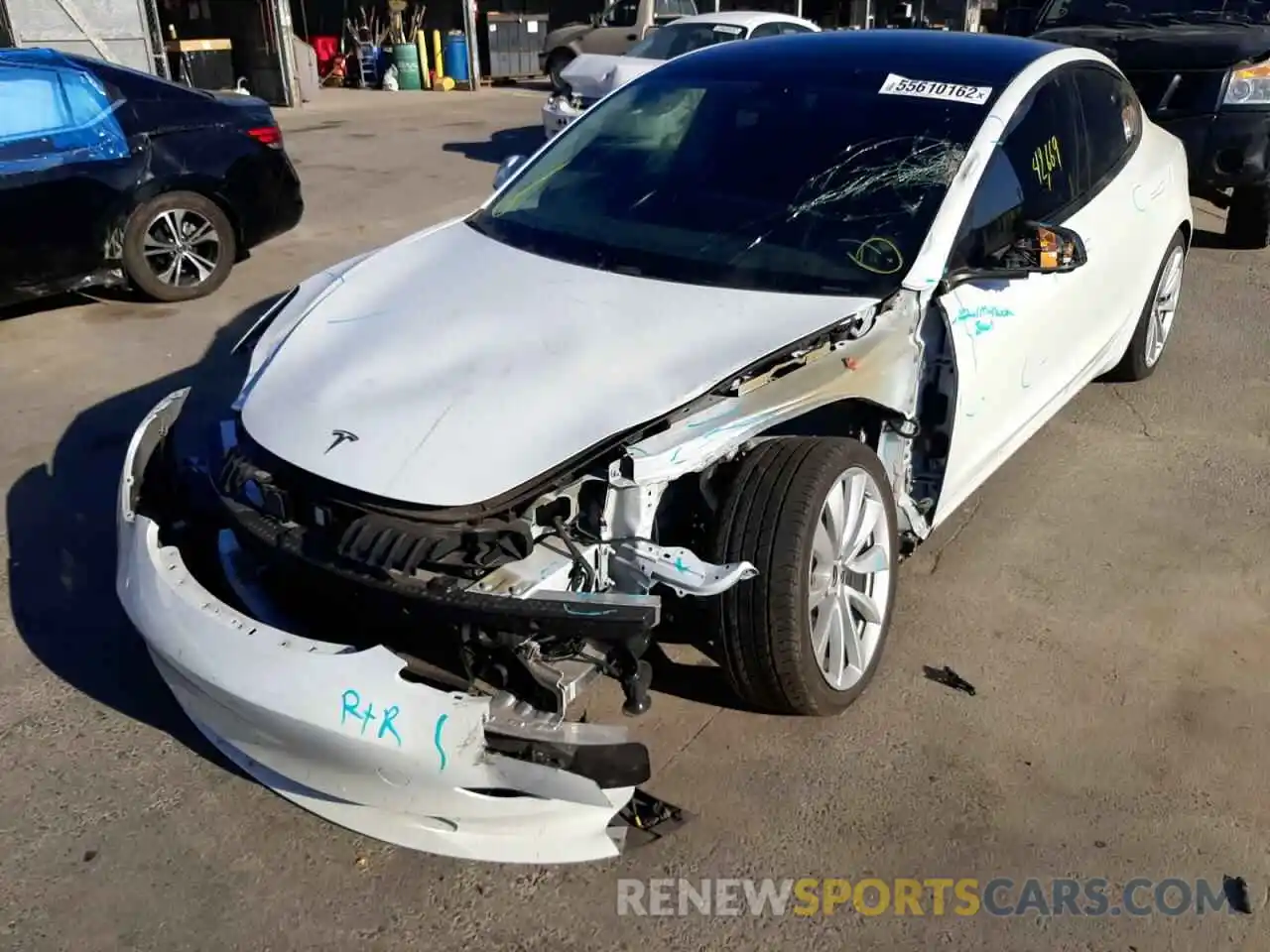 2 Photograph of a damaged car 5YJ3E1EB4LF711933 TESLA MODEL 3 2020