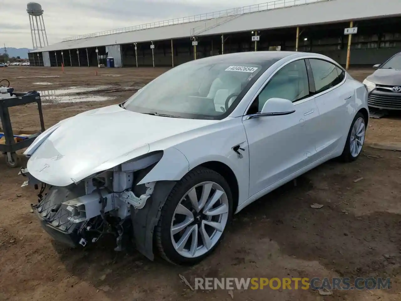 1 Photograph of a damaged car 5YJ3E1EB4LF712886 TESLA MODEL 3 2020