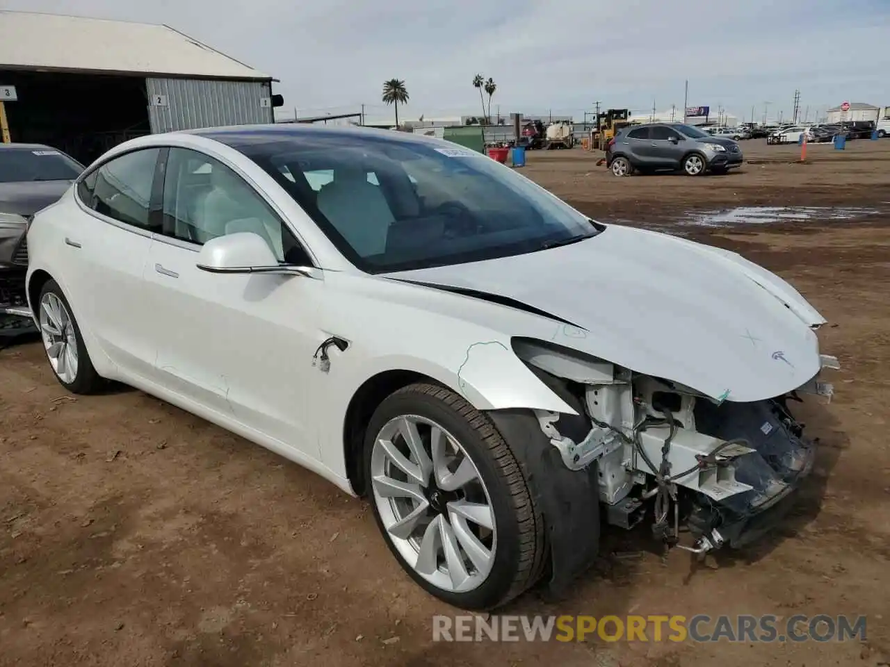 4 Photograph of a damaged car 5YJ3E1EB4LF712886 TESLA MODEL 3 2020