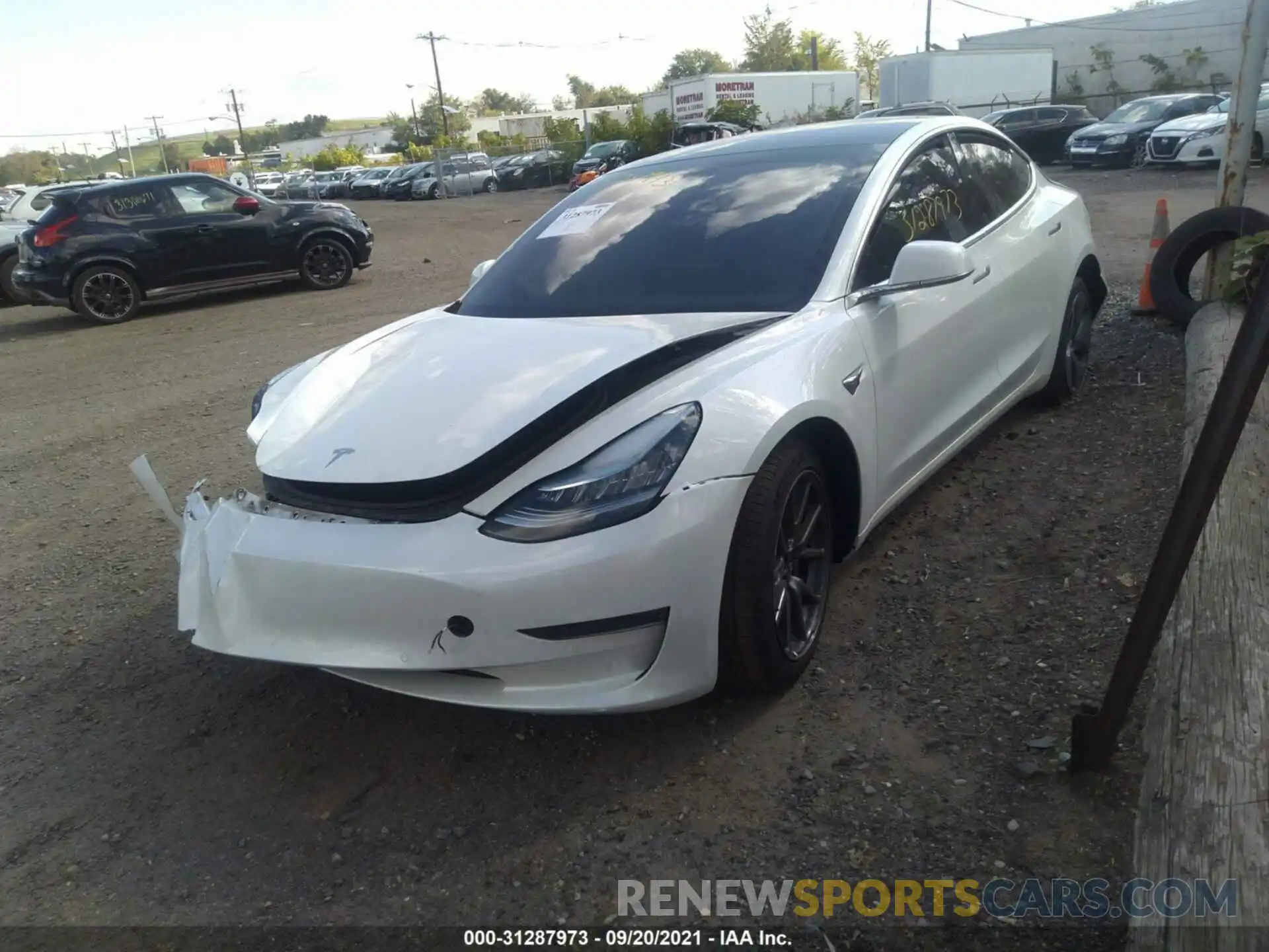 2 Photograph of a damaged car 5YJ3E1EB4LF735228 TESLA MODEL 3 2020