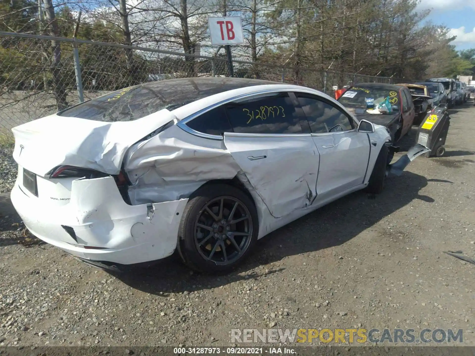 4 Photograph of a damaged car 5YJ3E1EB4LF735228 TESLA MODEL 3 2020