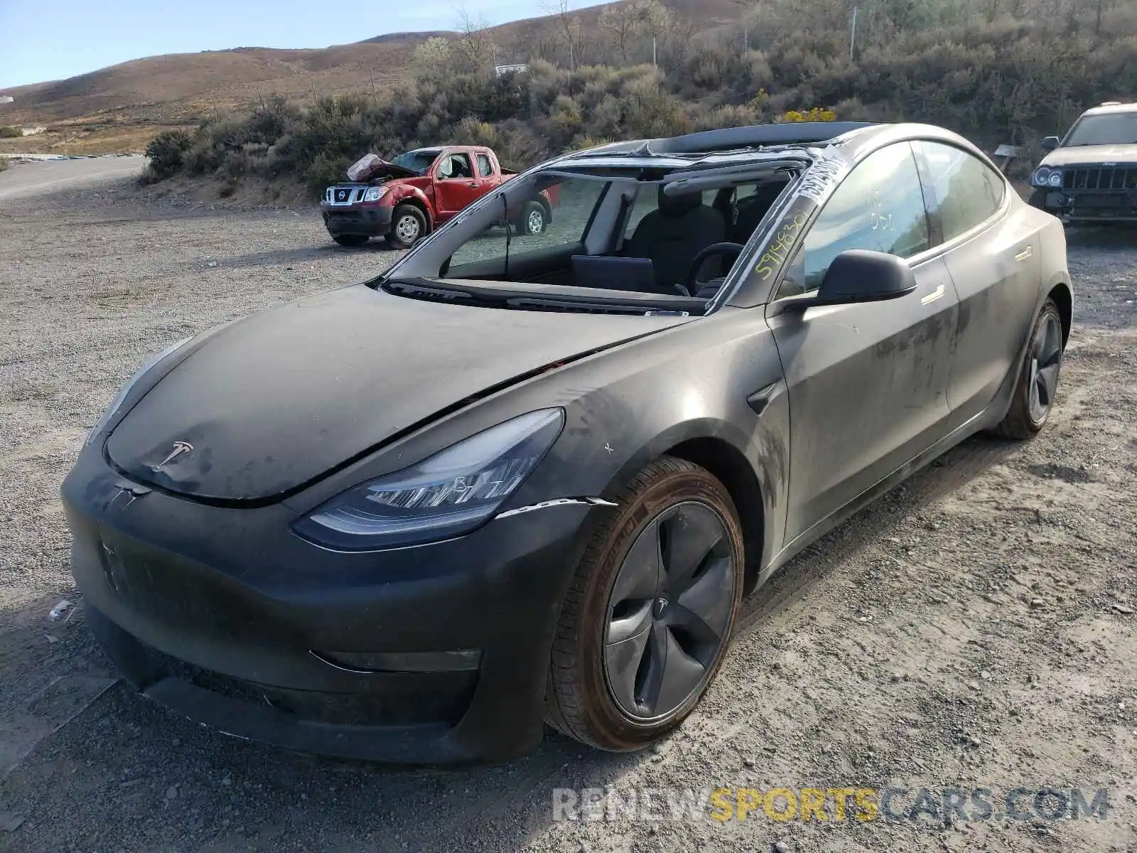 2 Photograph of a damaged car 5YJ3E1EB4LF790794 TESLA MODEL 3 2020